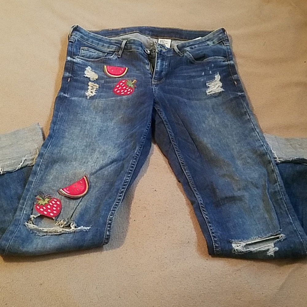 Custom distressed H&M skinny jeans with decals